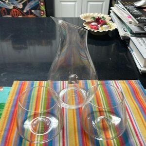 Pitcher with matching cocktail glasses.